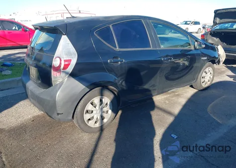 2014 Toyota Prius C One from USA, damaged, VIN JTDKDTB32E1557743